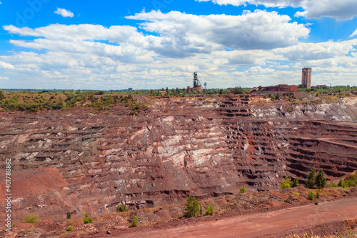 View of huge iron ore quarry in Kryvyi Rih, Ukraine. Open pit mining photo