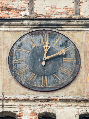 Close up with the clock from the iconic Clocktower in Sighisoara citadel.