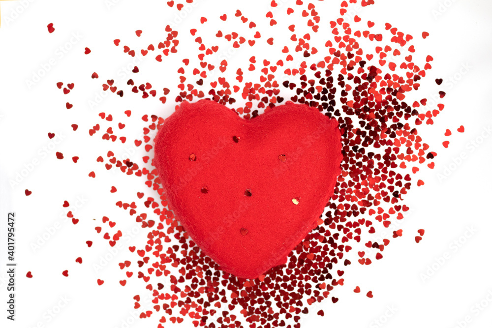 Flat felt red heart with lots of small glitter hearts, symbol of love and care for valentines day Flat felt red heart with lots of small glitter hearts, symbol of love and care for valentines day