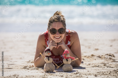 Caucasian female in a bathing suit on a tropical beach in Barbados  © Matt