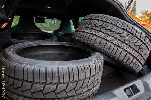 Detail of a full trunk of winter tires