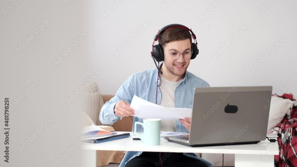 sitting infront of the laptop during meeting to reduce corona virus infection business computer headset businessman young call headphones office operator woman service person phone customer sitting infront of the laptop during meeting to reduce corona virus infection business computer headset businessman young call headphones office operator woman service person phone customer