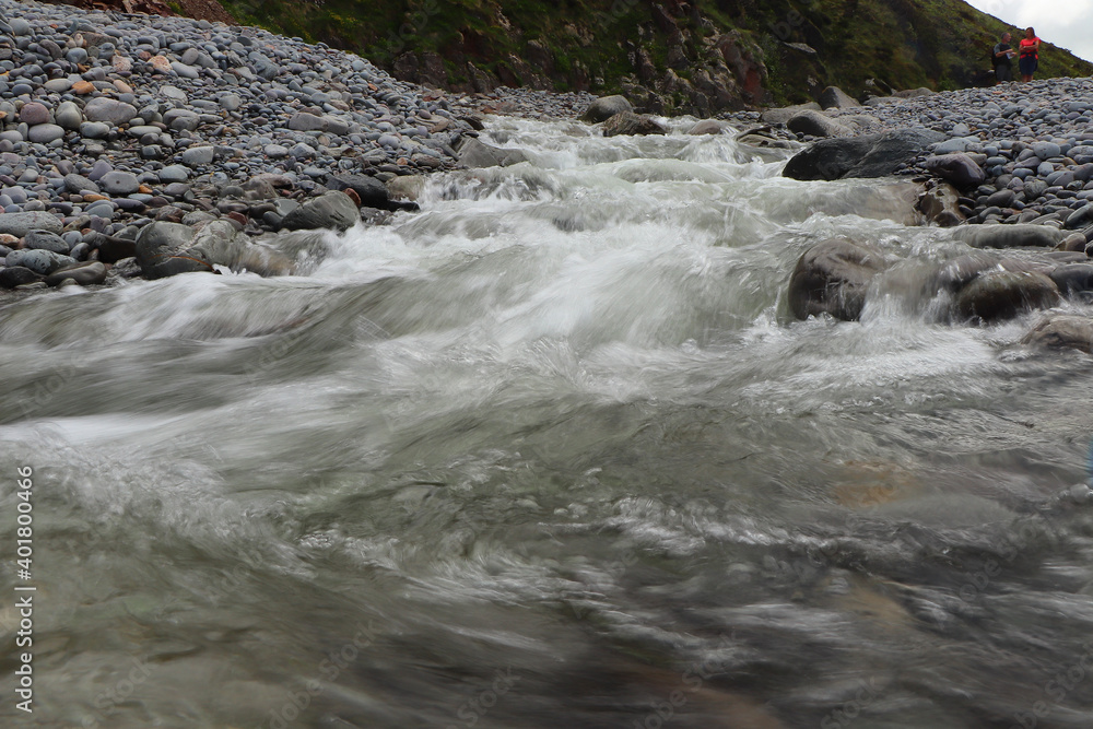 Heddon river flowing through the valley and over rocky ground Heddon river flowing through the valley and over rocky ground