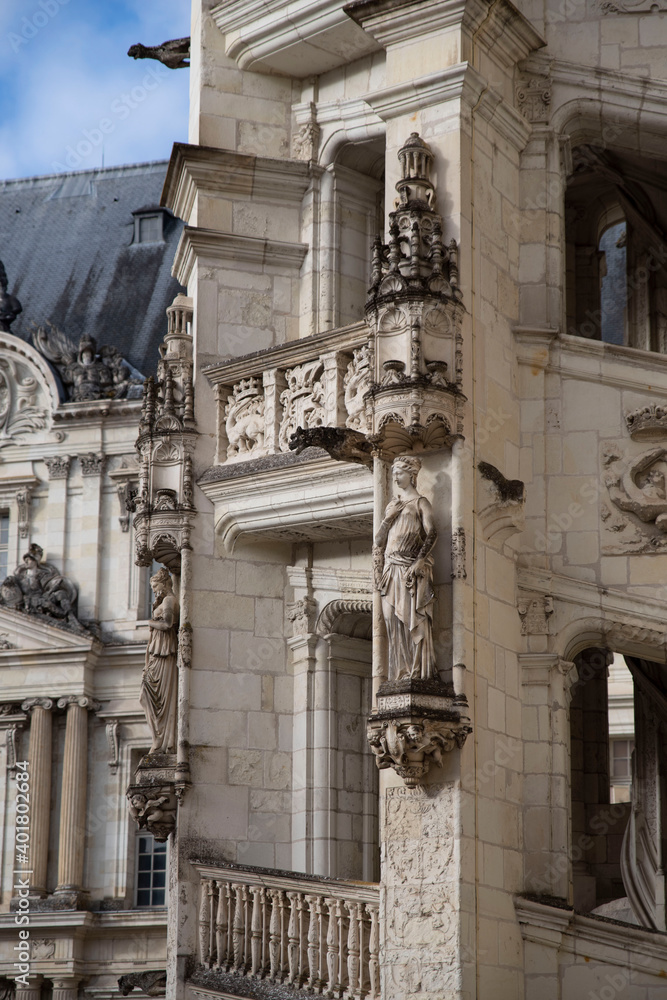 Statue and detail of the façade of the Blois castle on the banks of the Loire in France