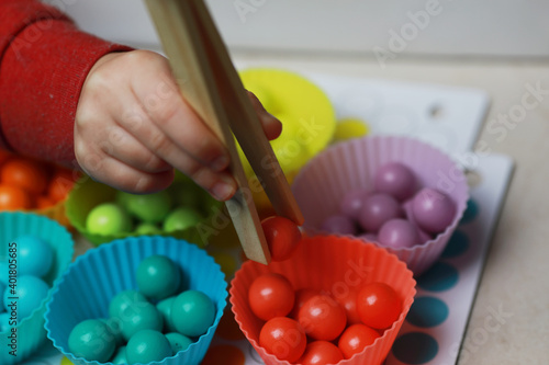 children's mosaic for the development of fine motor skills
 photo