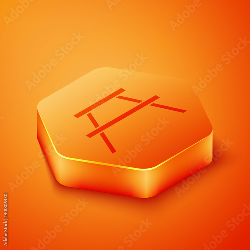 Isometric Picnic table with benches on either side of the table icon isolated on orange background. Orange hexagon button. Vector.