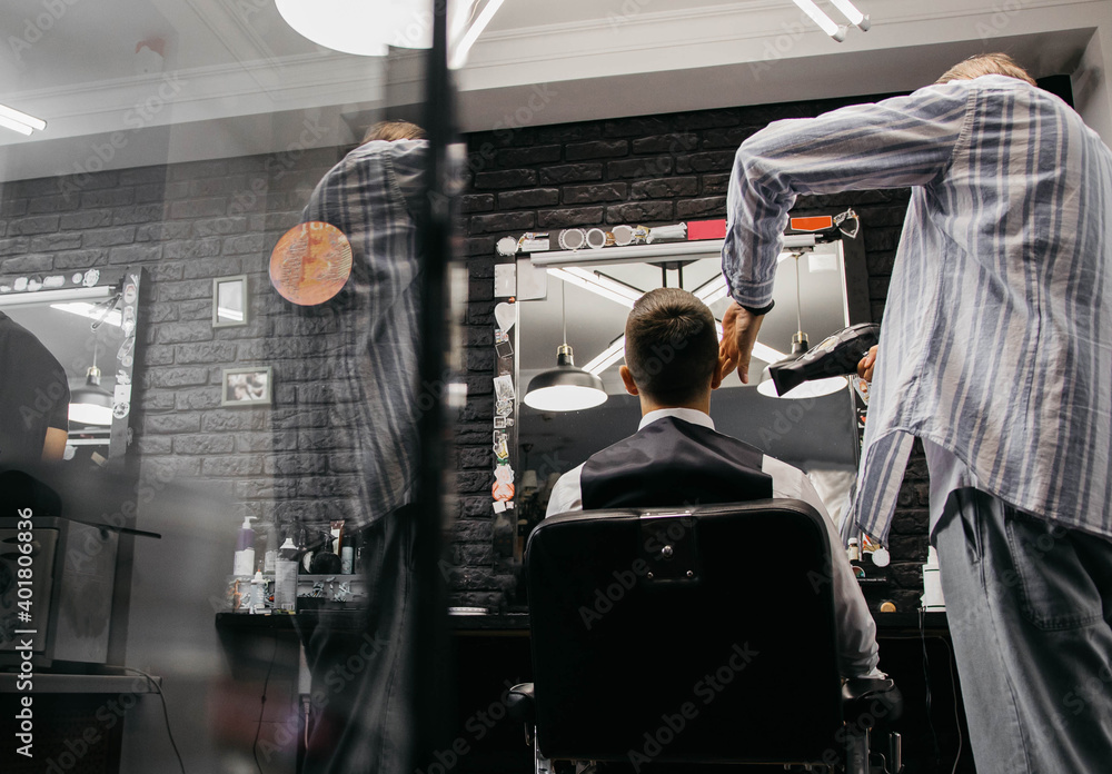 Men's haircut at the barber scissors Men's haircut at the barber scissors