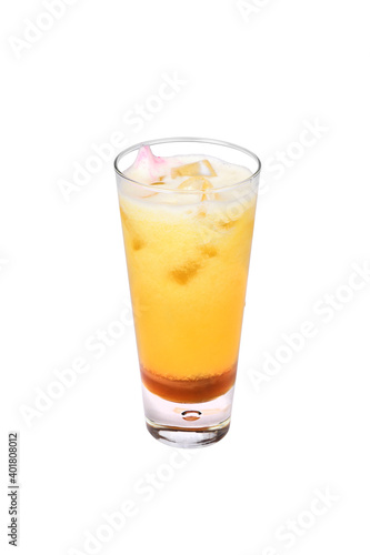orange juice in glass with ice