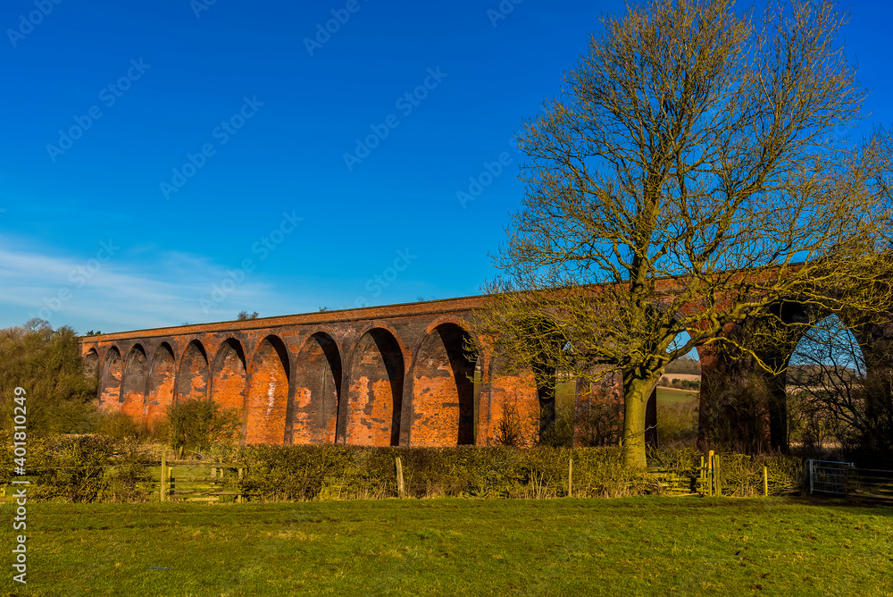 A close up view of the Victorian railway viaduct for the London and North Western Railway at John O'Gaunt valley, Leicestershire, UK in winter