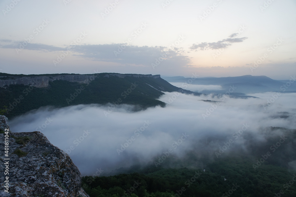 Fototapeta premium Sunset over the mountains, Fog over the mountains, Mangup Kale, Cave towns of Crimea, Crimea, , Black Sea