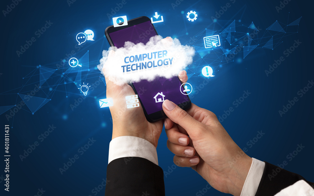 Female hand holding smartphone with COMPUTER TECHNOLOGY inscription, cloud technology concept Female hand holding smartphone with COMPUTER TECHNOLOGY inscription, cloud technology concept