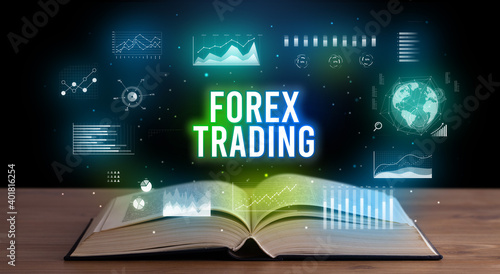 FOREX TRADING inscription coming out from an open book, creative business concept photo