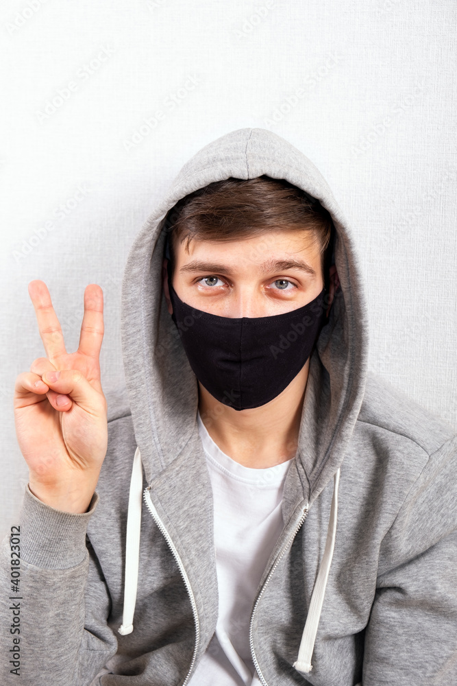 Young Man in Flu Mask