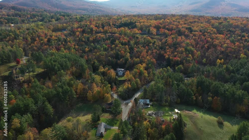 New England, Vermont, USA. Aerial View of Coloful Hillside and Houses on Autumn Day. Colorful Landscape, Drone Shot New England, Vermont, USA. Aerial View of Coloful Hillside and Houses on Autumn Day. Colorful Landscape, Drone Shot