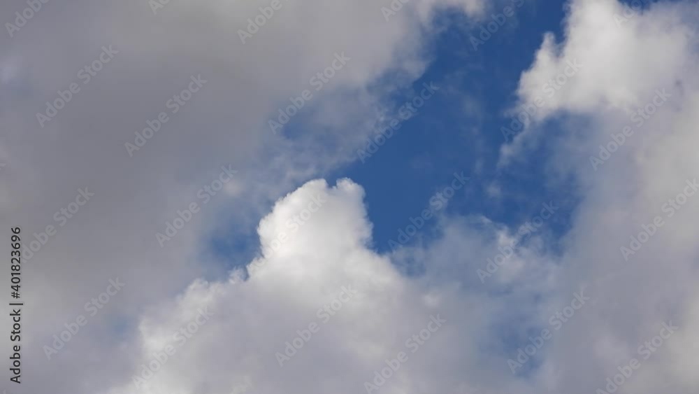Abstract time-lapse loop still video of beautiful cloudscape on deep blue sky Abstract time-lapse loop still video of beautiful cloudscape on deep blue sky