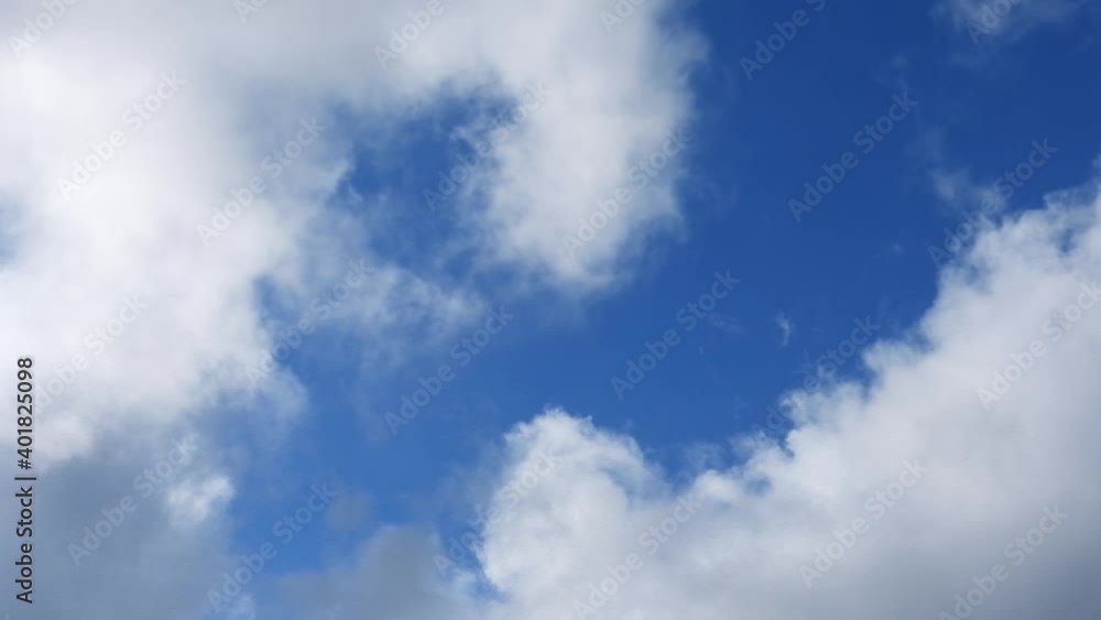 Abstract time-lapse loop still video of beautiful cloudscape on deep blue sky Abstract time-lapse loop still video of beautiful cloudscape on deep blue sky