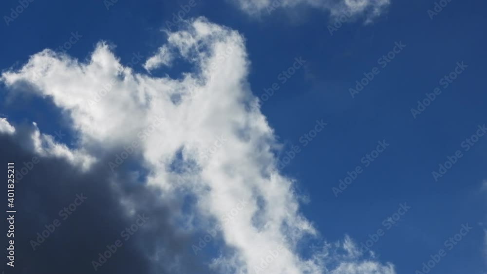 Abstract time-lapse loop still video of beautiful cloudscape on deep blue sky Abstract time-lapse loop still video of beautiful cloudscape on deep blue sky