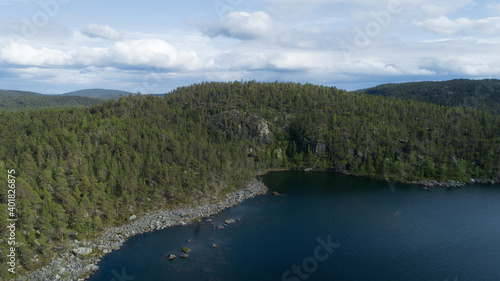 A cloudy summer morning view of a rocky section of Lake, Rocky Mountain. © raland
