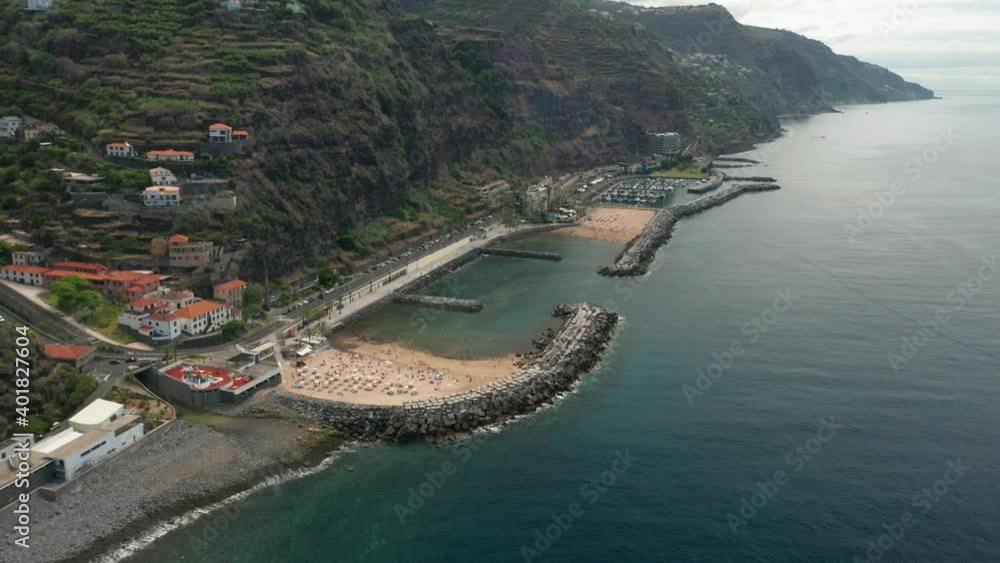Unnatural sandy beach on coastline of Madeira Island, part of Portugal Unnatural sandy beach on coastline of Madeira Island, part of Portugal