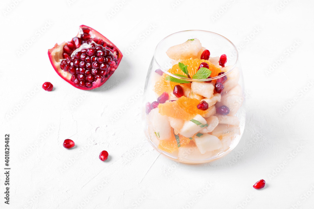 Fruit salad with apple, pear, banana, orange, pomegranate seeds and mint served in the portion glass. Sugar free dessert Fruit salad with apple, pear, banana, orange, pomegranate seeds and mint served in the portion glass. Sugar free dessert
