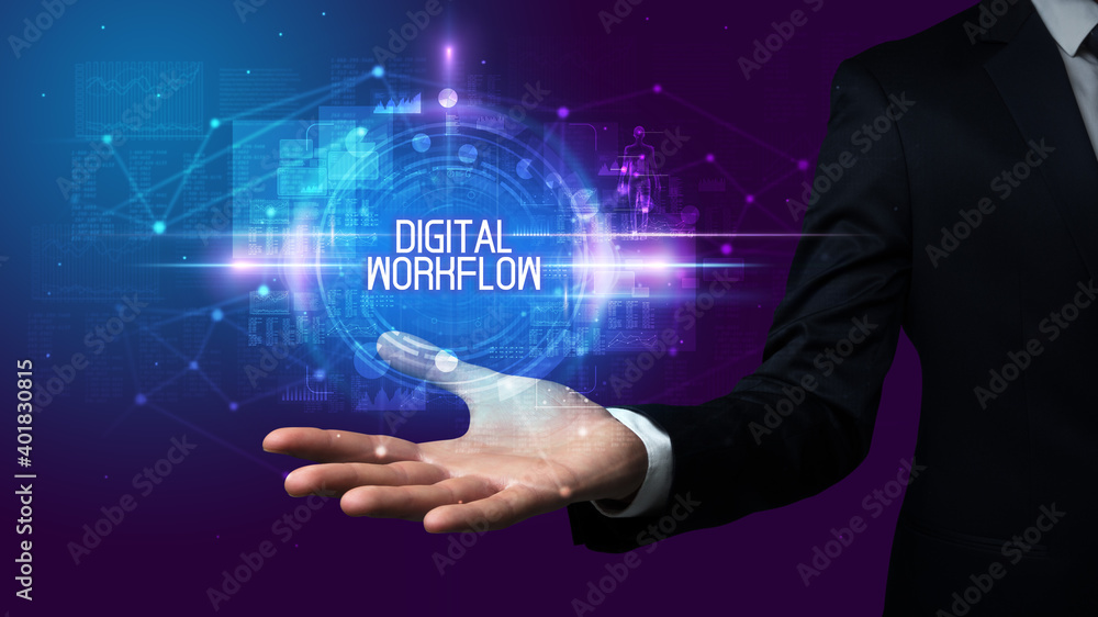 Man hand holding DIGITAL WORKFLOW inscription, technology concept Man hand holding DIGITAL WORKFLOW inscription, technology concept