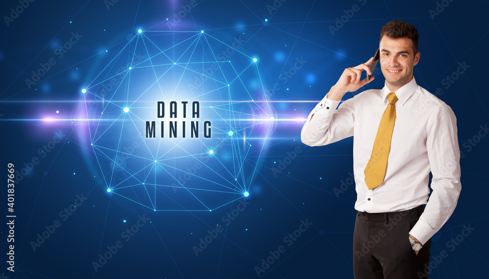 Businessman thinking about security solutions with DATA MINING inscription Businessman thinking about security solutions with DATA MINING inscription