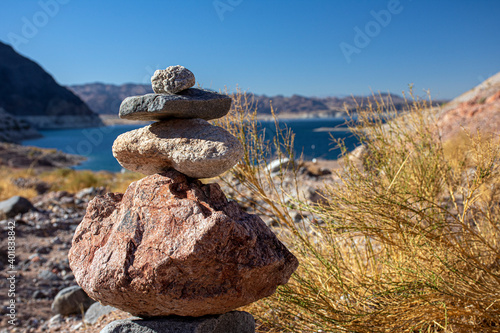 Rock Cairn at Lake Mead, Nevada - stones stacked on top of each other acting as natural marker and guide for hikers