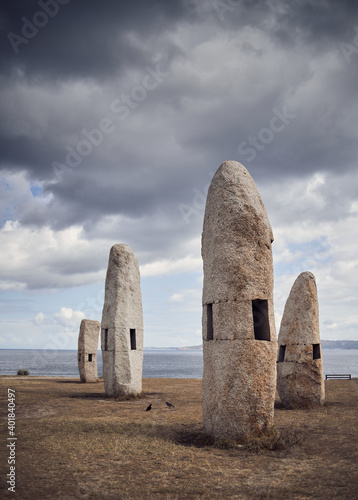 Holidays in A Coruña. Dramatic sky on top of the stones.