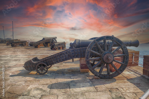 A closeup of an old cannon on the outer walls of the Mehrengarh Fort of  Jodhpur, Rajasthan in India photo