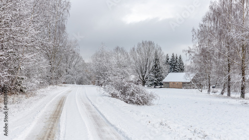 Beautiful winter Christmas landscape in countryside with old houses and a lot of snow