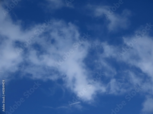 Beautiful white cloud against a blue sky in winter in Israel. Close-up nature.