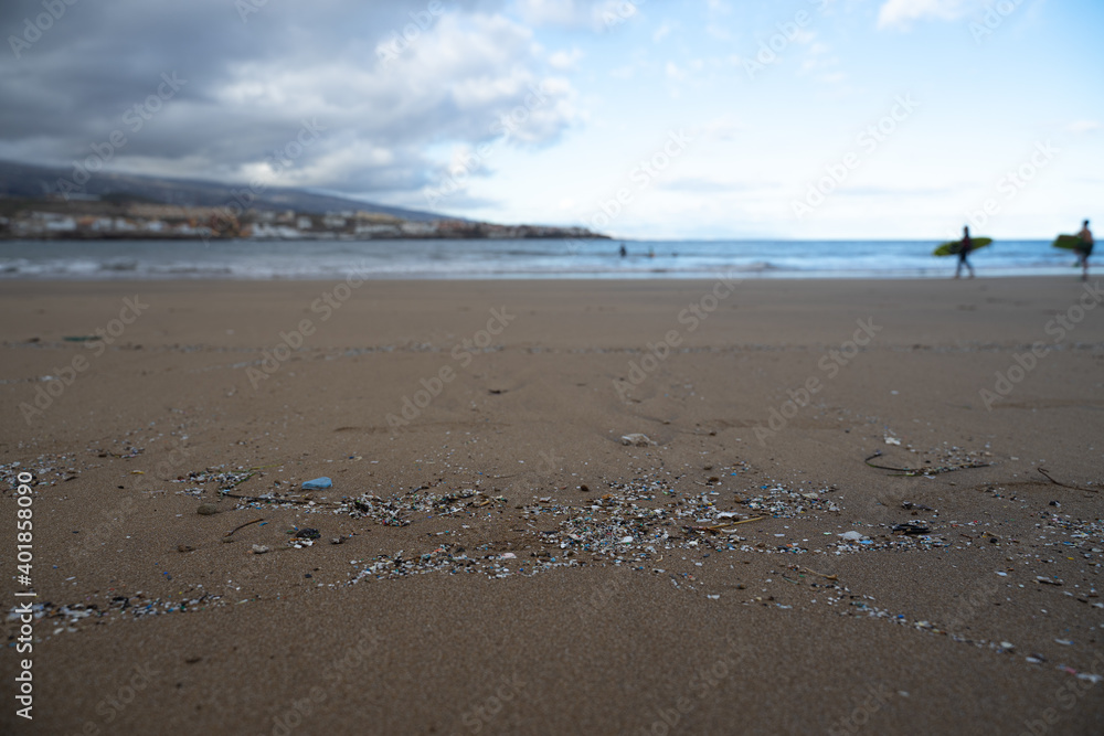 A shot of plastic and microplastic on the beach in the Canary Islands - plastic pollution