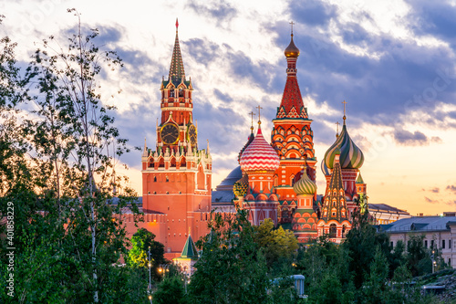 Cathedral of Vasily the Blessed (Saint Basil's Cathedral) and Spasskaya Tower of Moscow Kremlin on Red Square at sunset, Moscow, Russia