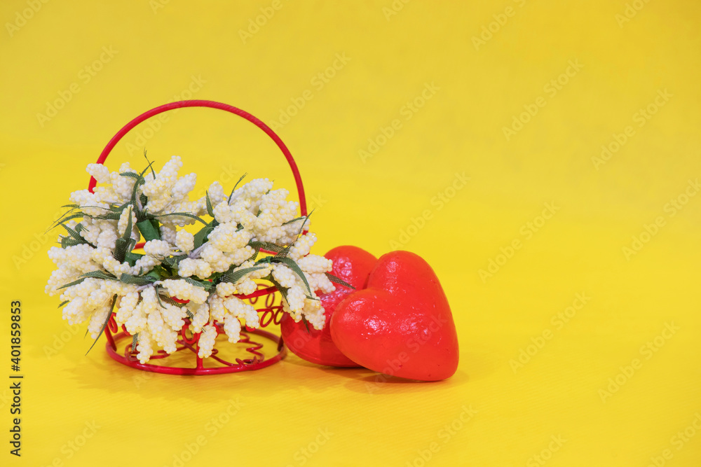Valentine's card. White flowers in a red basket with hearts. Heart Valentine's card. White flowers in a red basket with hearts. Heart
