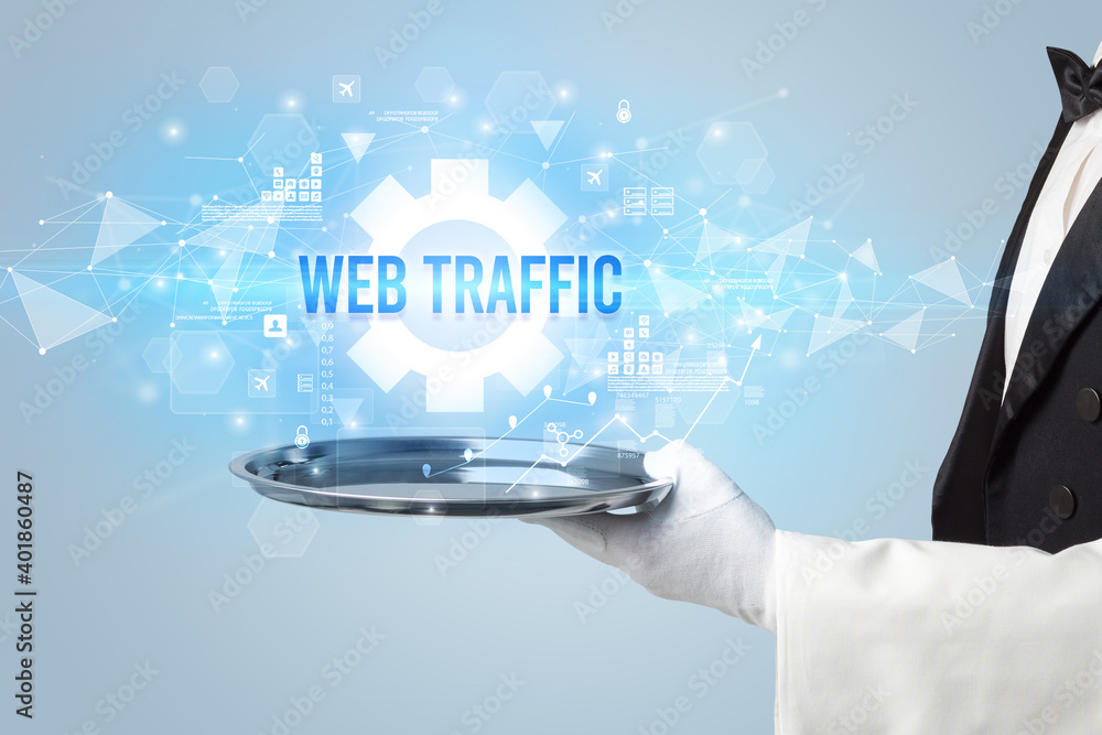 Waiter serving new technology concept with WEB TRAFFIC inscription Waiter serving new technology concept with WEB TRAFFIC inscription