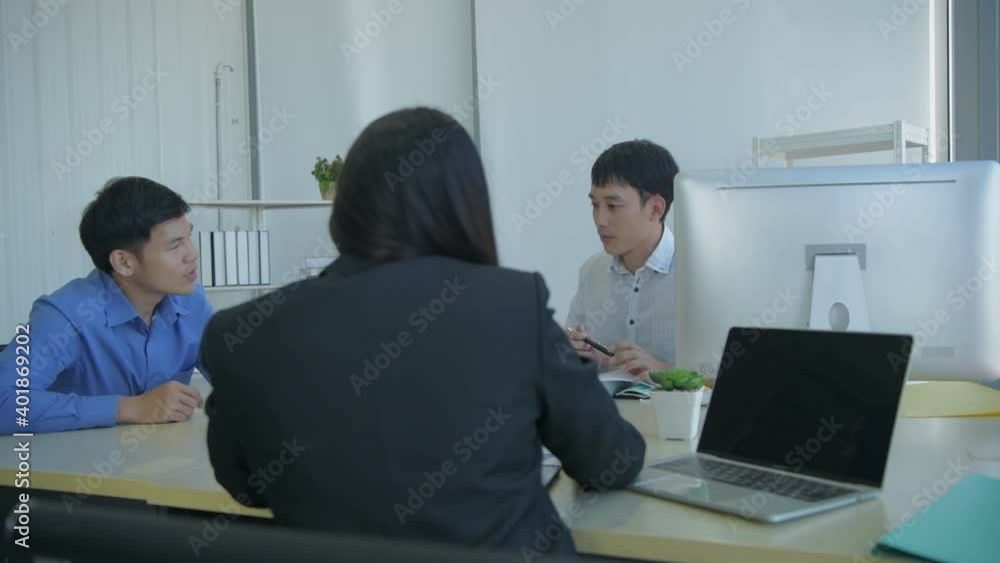 Business concept of 4k Resolution. Partners are talking to each other in the office. Business concept of 4k Resolution. Partners are talking to each other in the office.