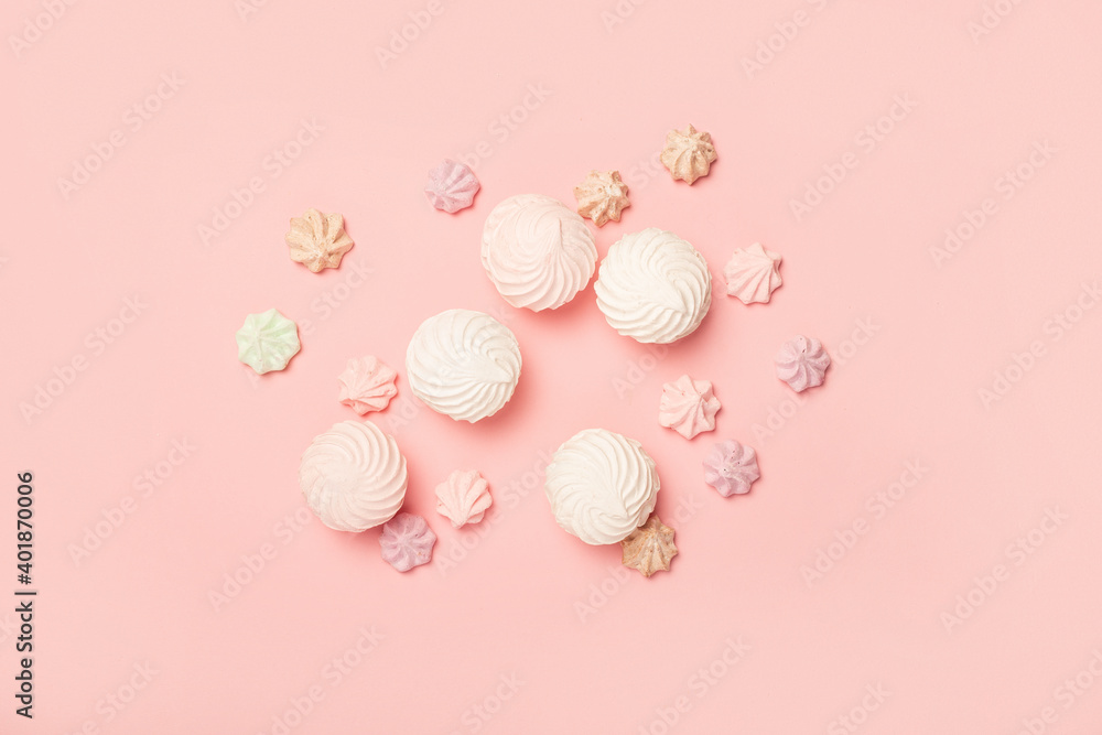 Sweets on a pastel pink background. Composition of confectionery. Flat lay, top view. Banner Sweets on a pastel pink background. Composition of confectionery. Flat lay, top view. Banner