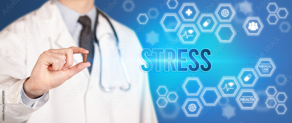 Close-up of a doctor giving you a pill with STRESS inscription, medical concept Close-up of a doctor giving you a pill with STRESS inscription, medical concept