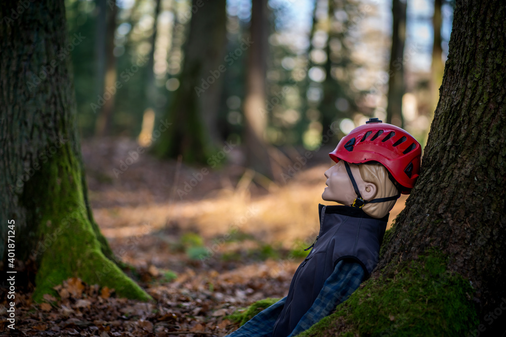 Resuscitation dummy is waiting for rescue in the forest