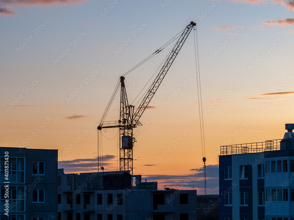Construction crane for lifting and mounting panels, blocks in the construction of residential buildings, high-rises, skyscrapers Construction crane for lifting and mounting panels, blocks in the construction of residential buildings, high-rises, skyscrapers