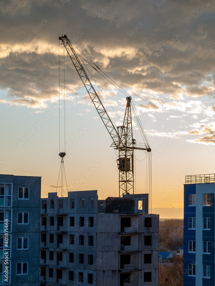 Construction crane for lifting and mounting panels, blocks in the construction of residential buildings, high-rises, skyscrapers Construction crane for lifting and mounting panels, blocks in the construction of residential buildings, high-rises, skyscrapers