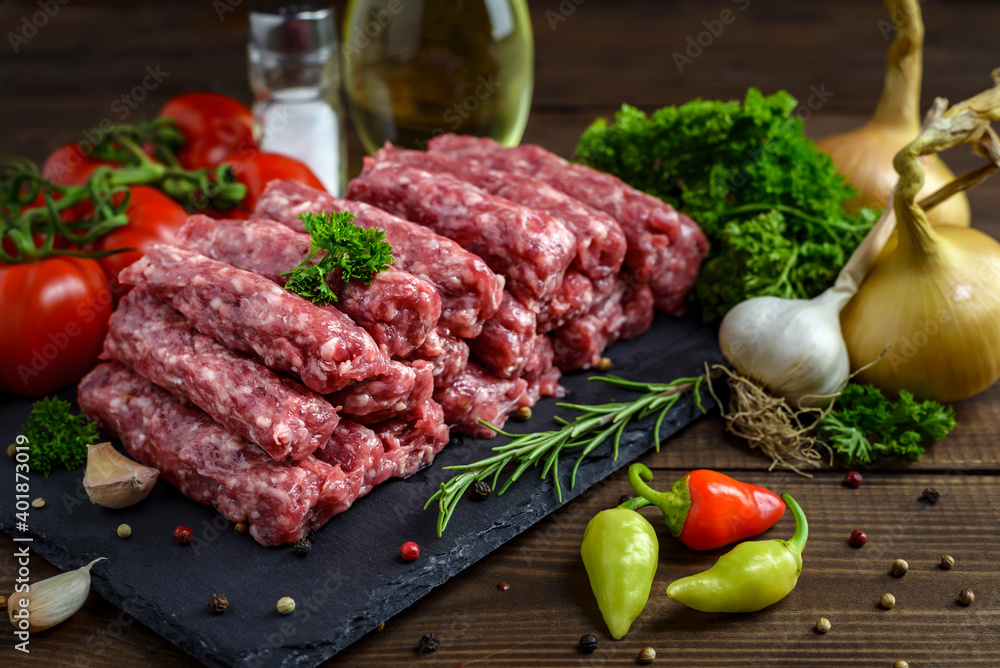 Traditional Balkan raw minced meat cevapcici or cevapi