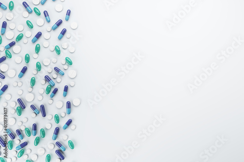 Abstract color capsule and pills on white background.