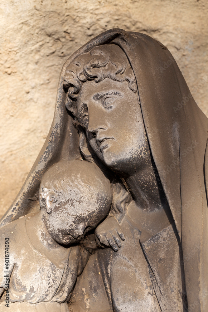 Fototapeta premium Historic Statue on the winter mystery old Prague Cemetery, Czech Republic