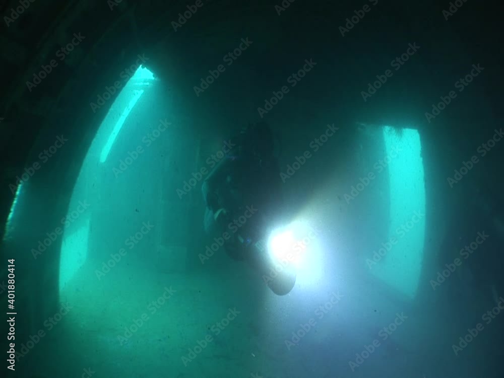 scuba divers exploring underwater diving activity scuba divers exploring underwater diving activity