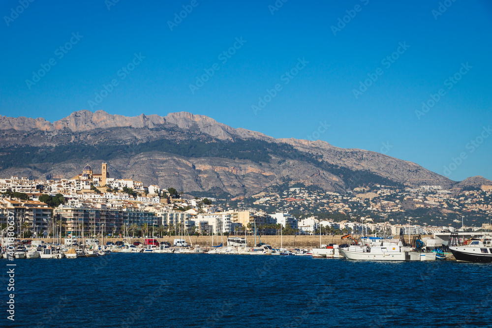 Harbour of Altea with view on mountain range with old city and cathedral, Altea, Costa Blanca, Spain