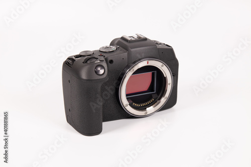 A closeup shot of a professional camera with the lens isolated on white background. photo