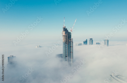 City skyscrapers in the clouds. Warsaw Poland. High quality photo
