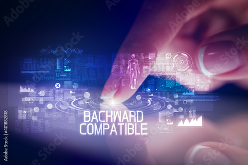 Finger touching tablet with web technology icons and BACKWARD COMPATIBLE inscription