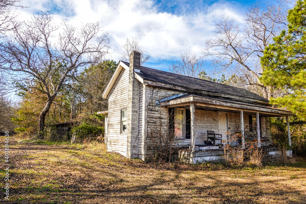 A landscape of an old house in North Carolina USA on a farm in HDR. A landscape of an old house in North Carolina USA on a farm in HDR.